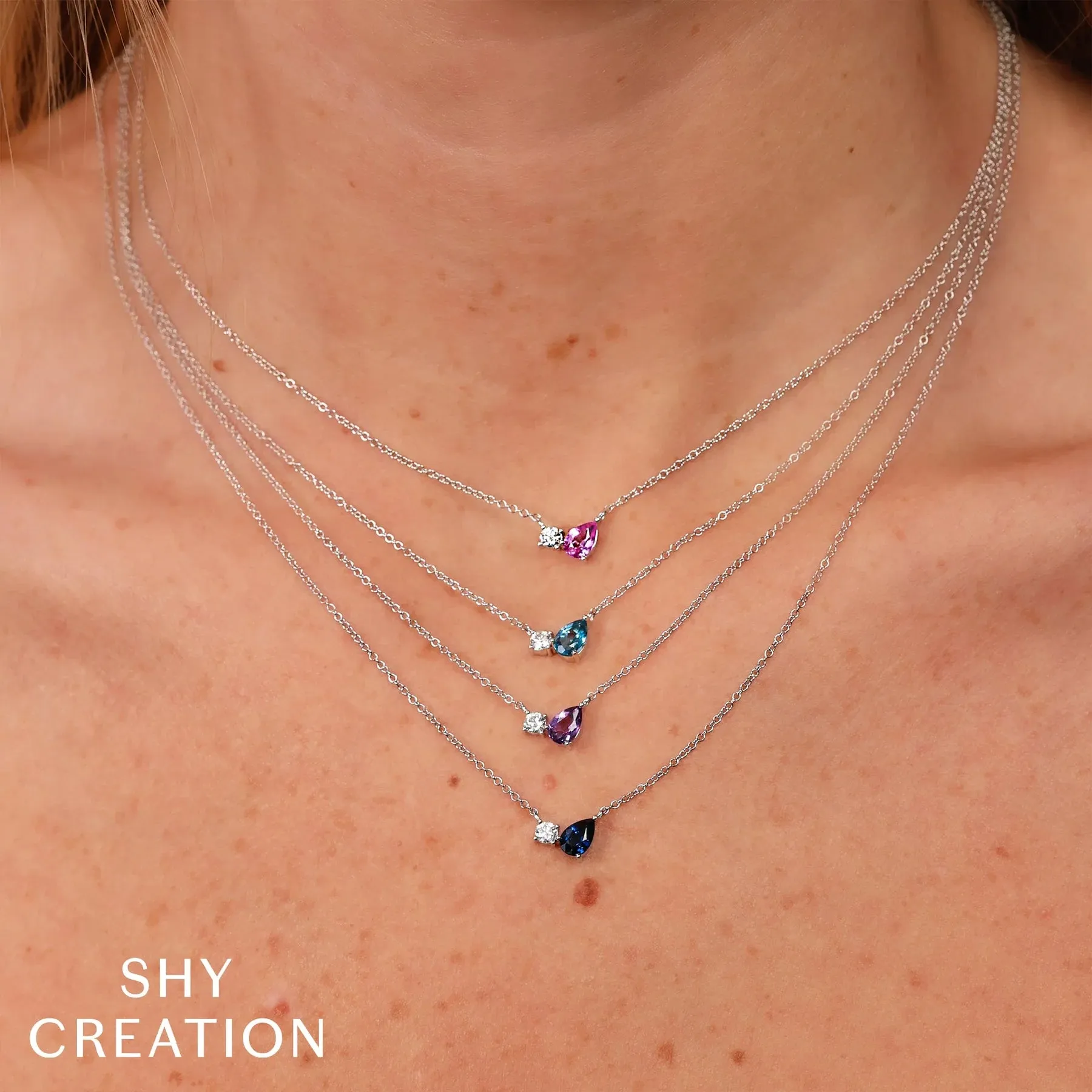 0.11ctw Diamond & Blue Sapphire Necklace