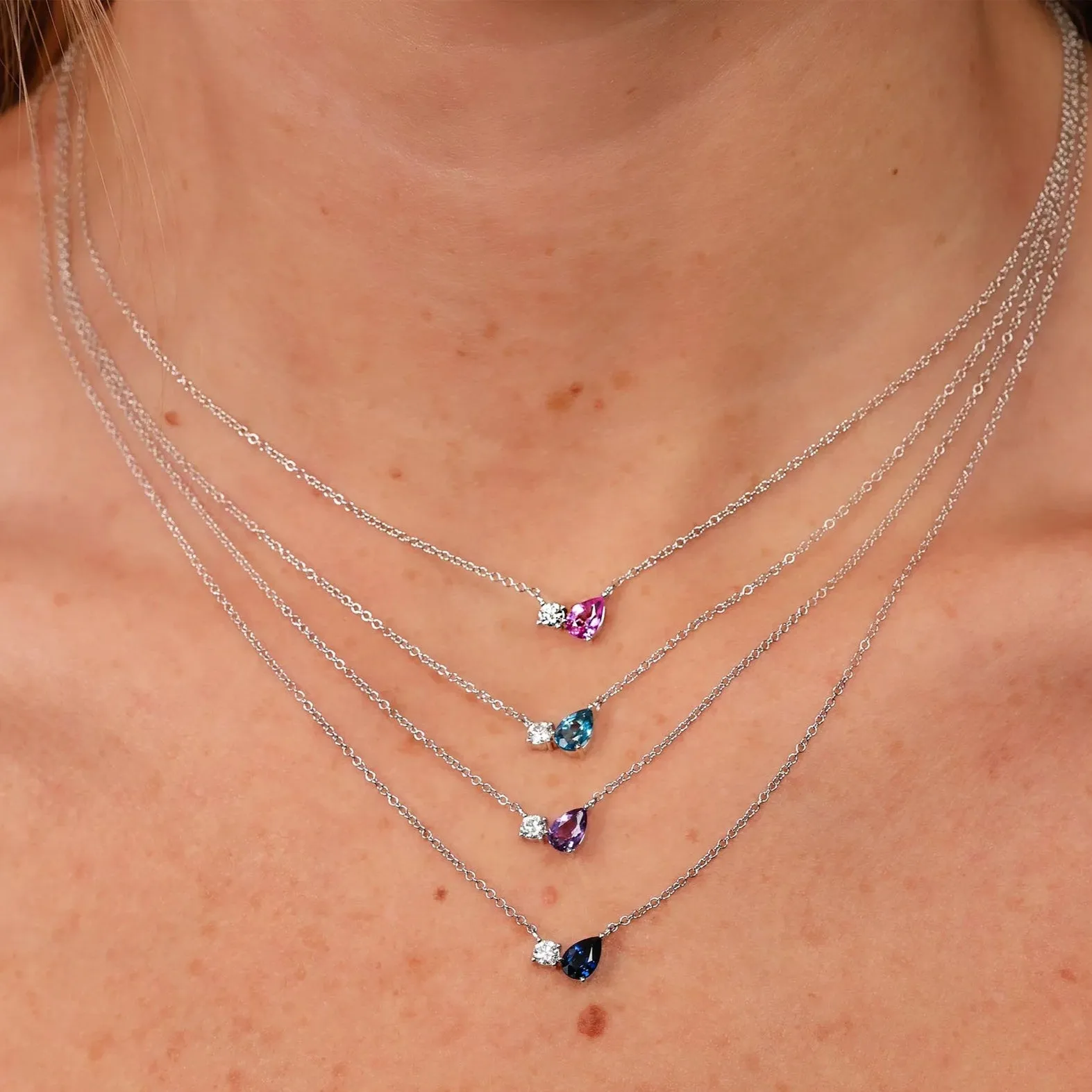 0.11ctw Diamond & Swiss Blue Topaz Pear Necklace