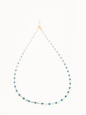 blue bead necklace- yellow gold