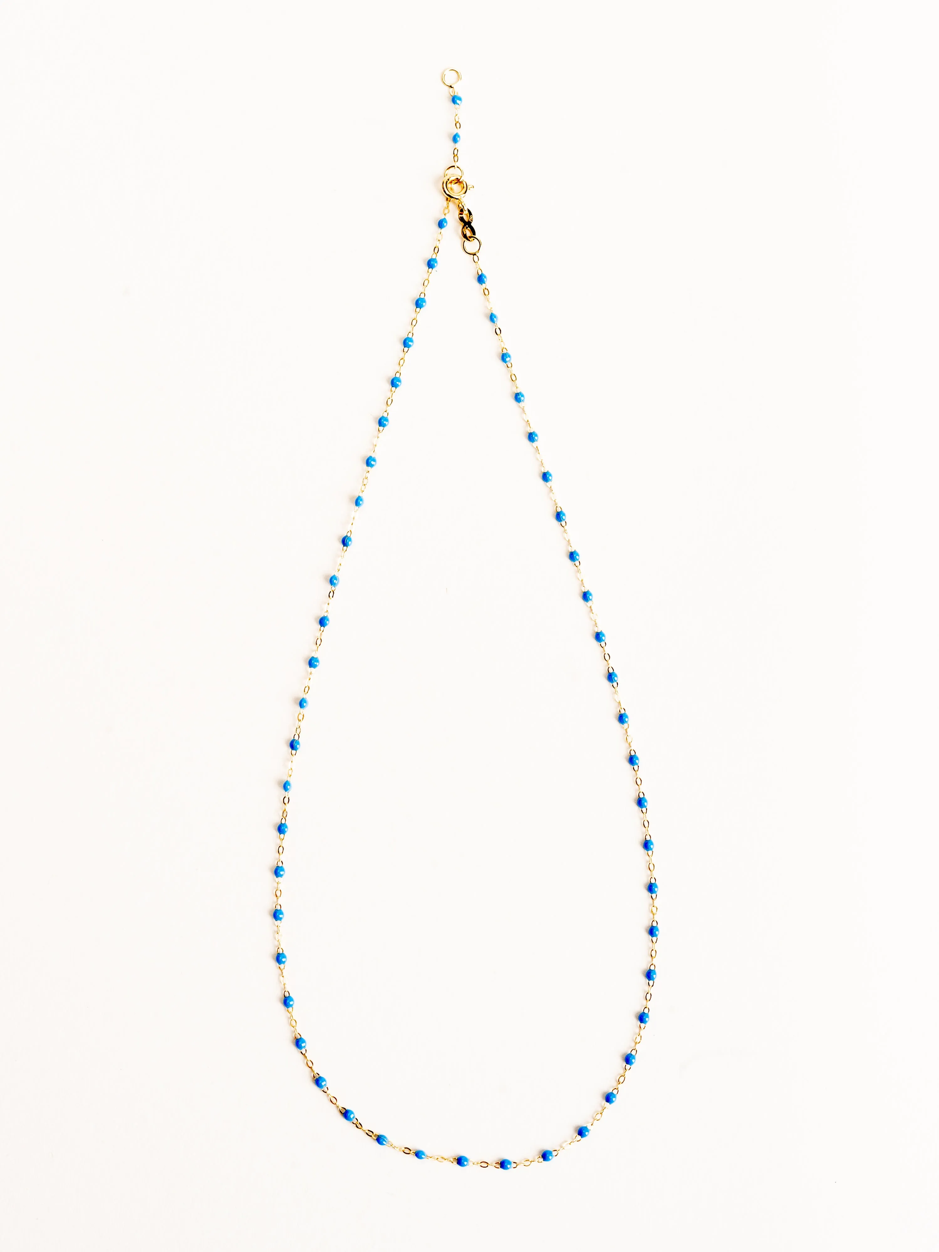 blue bead necklace- yellow gold