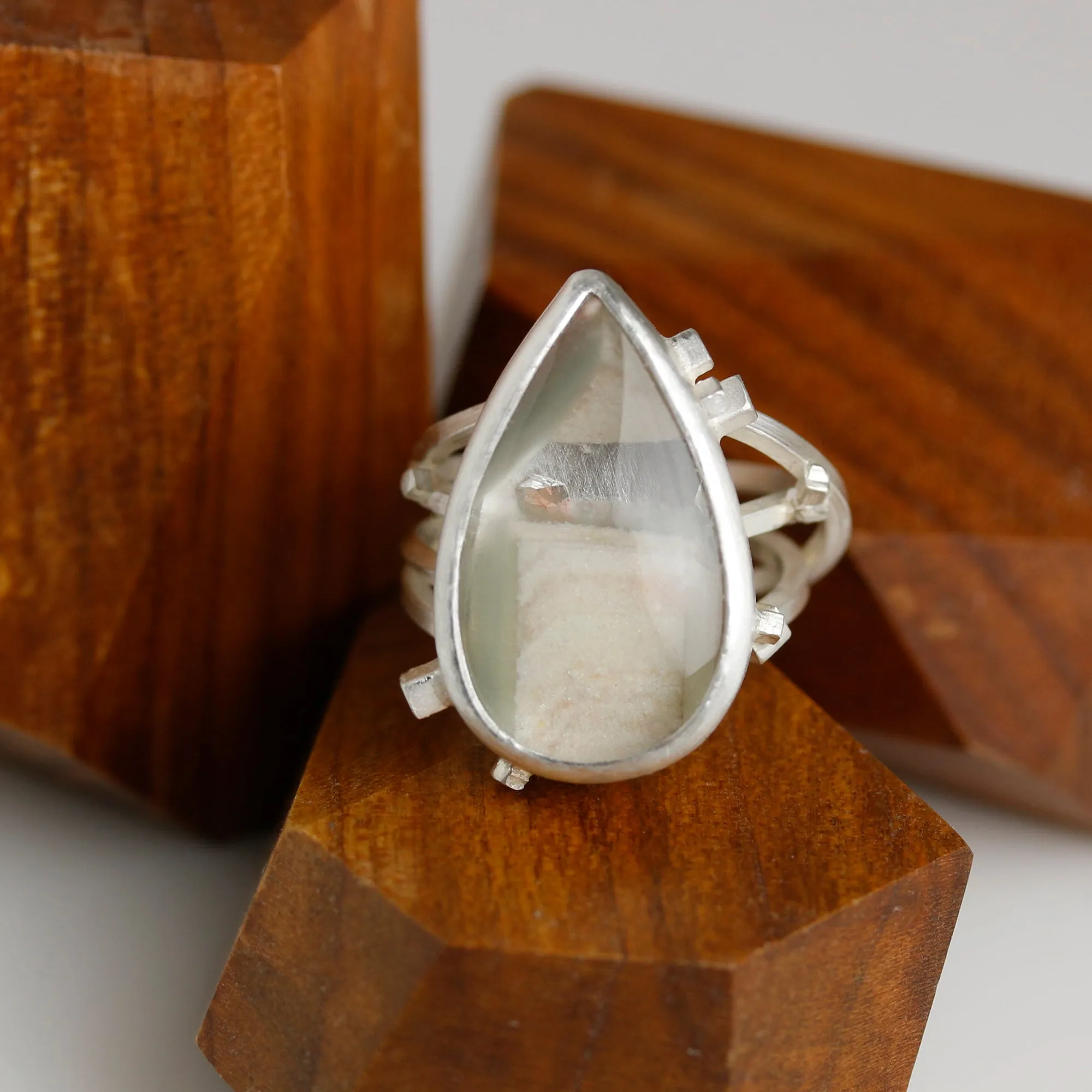 Included Quartz on a Square Wire Swirled Band. Size 7 1/4.