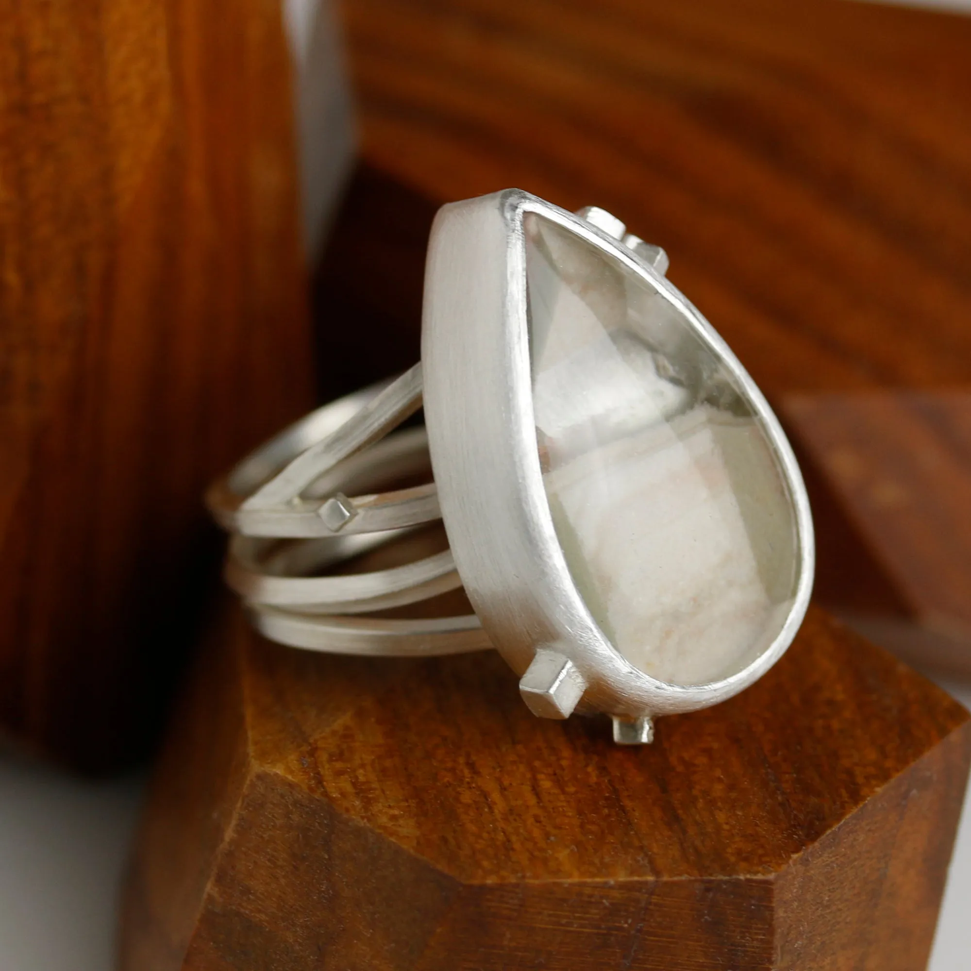 Included Quartz on a Square Wire Swirled Band. Size 7 1/4.