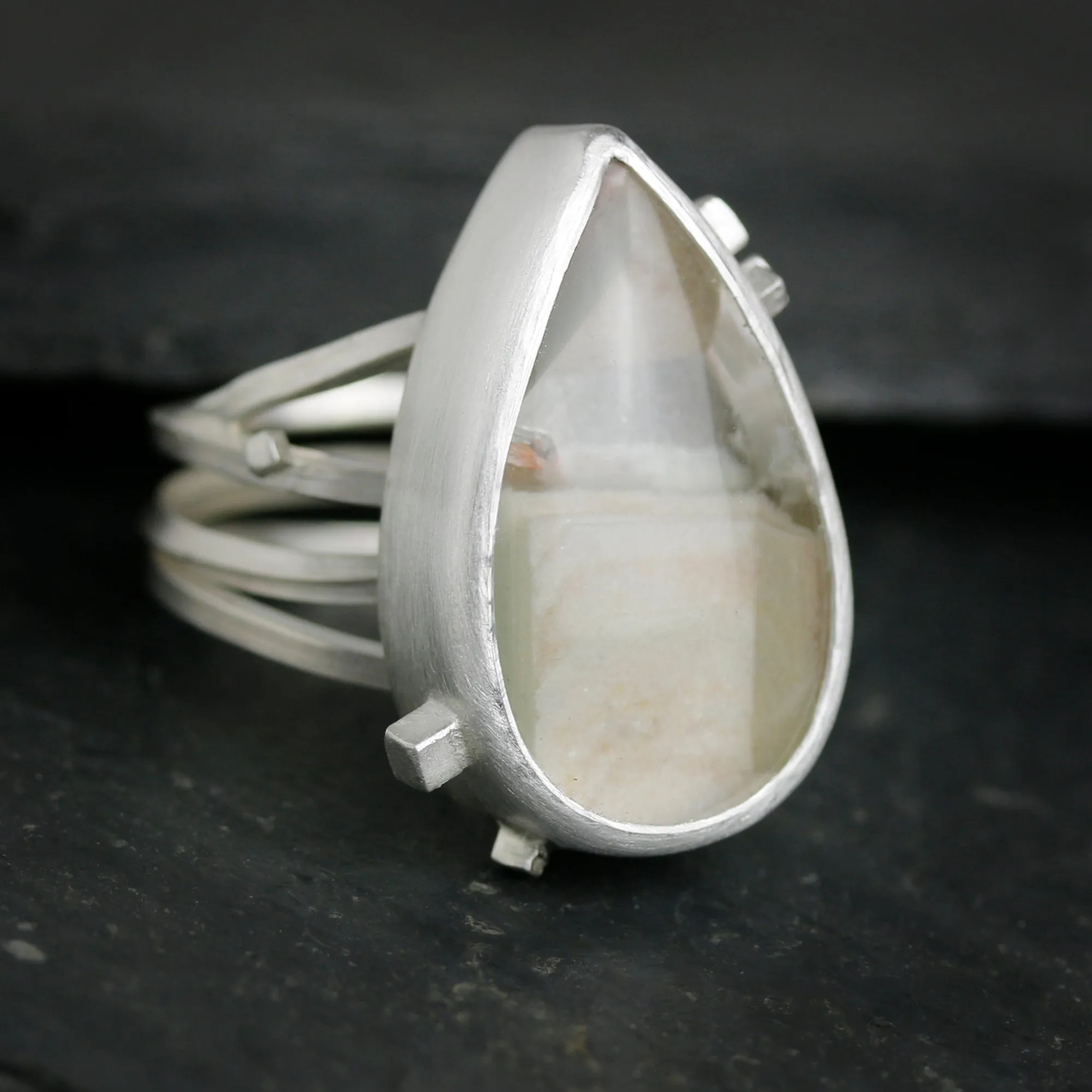 Included Quartz on a Square Wire Swirled Band. Size 7 1/4.