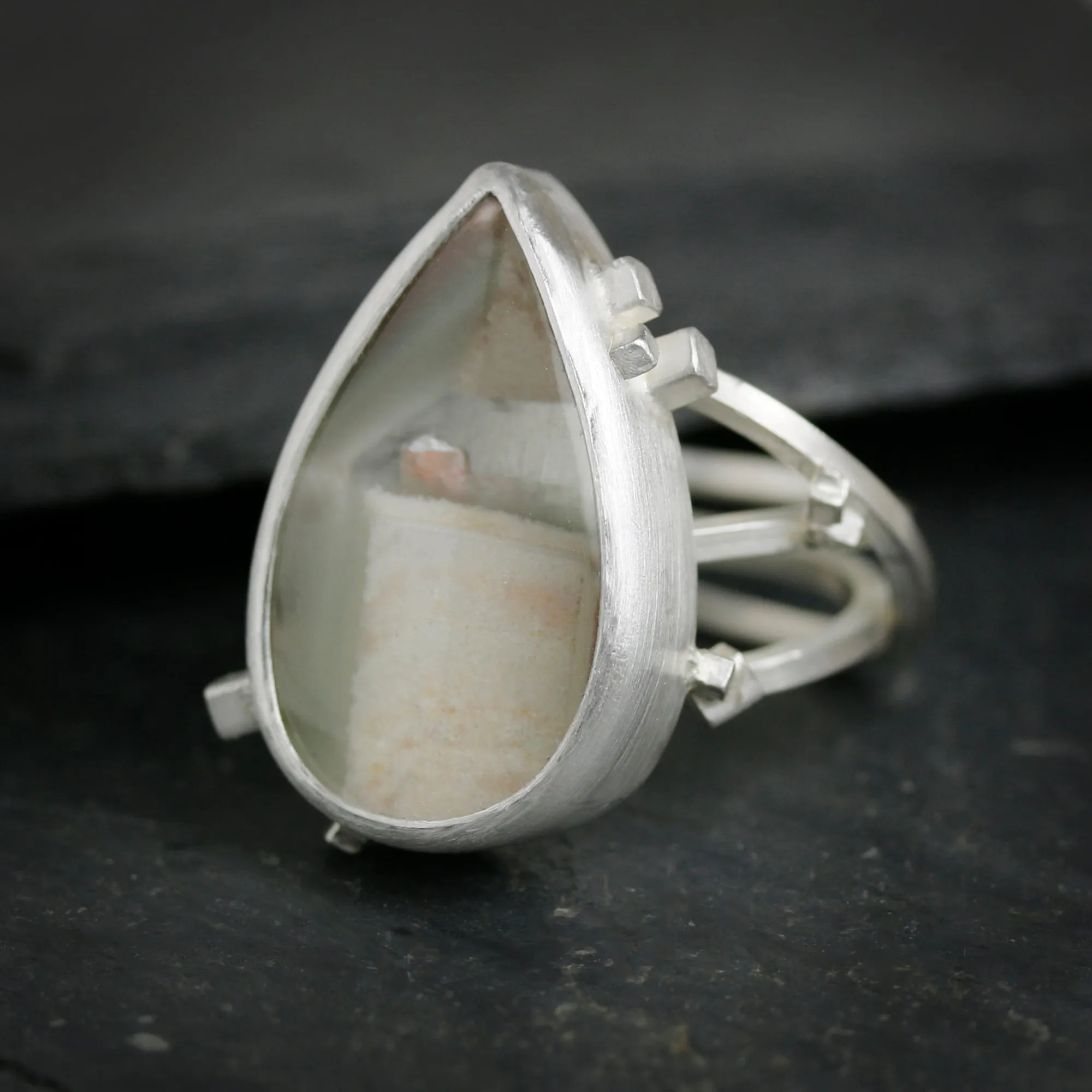 Included Quartz on a Square Wire Swirled Band. Size 7 1/4.