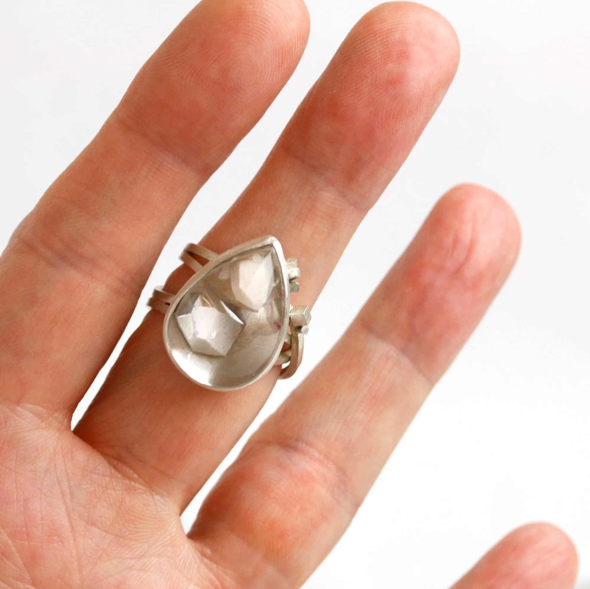 Included Quartz on a Square Wire Swirled Band. Size 8.