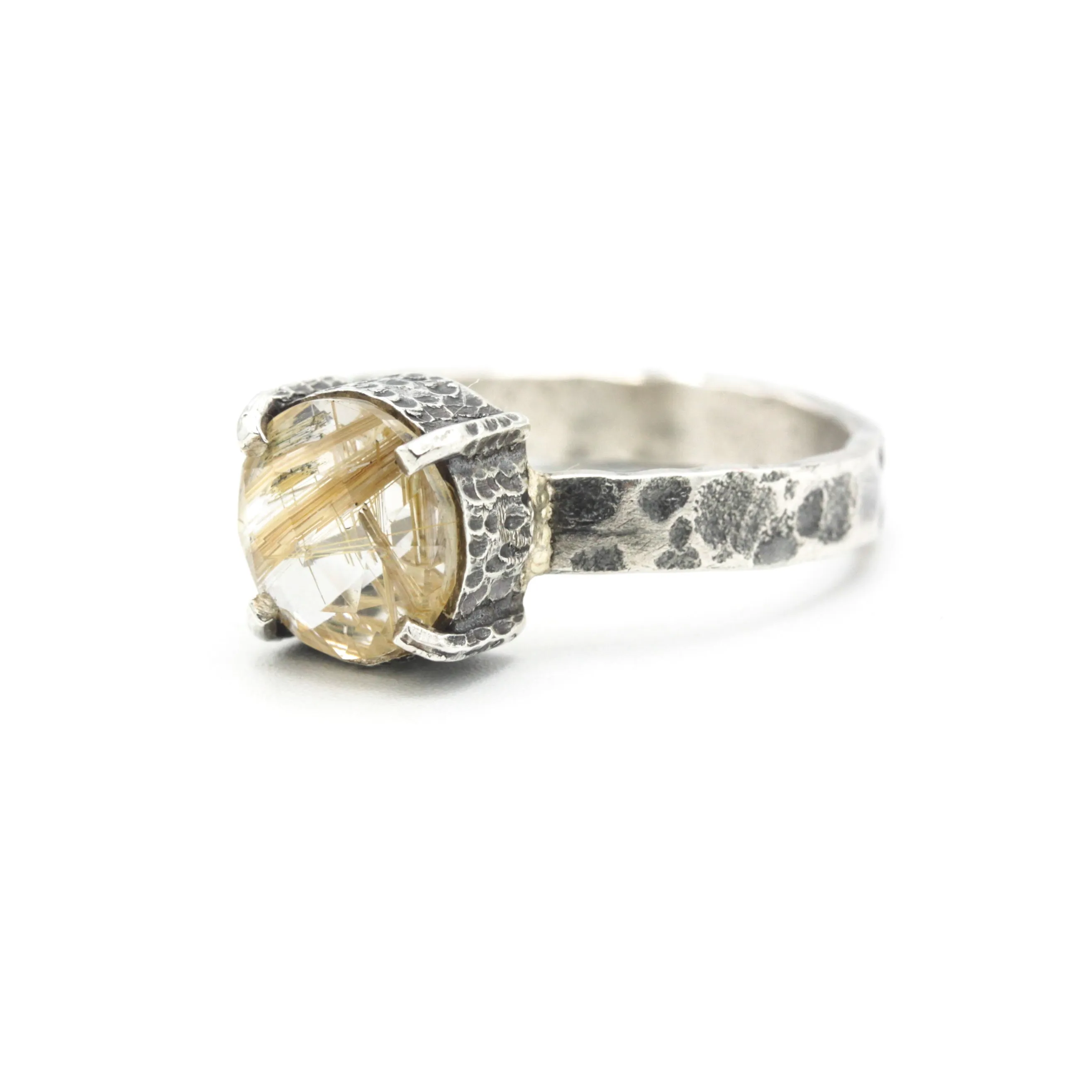 Round faceted golden rutilated quartz ring in silver bezel and prongs setting with sterling silver texture oxidized band